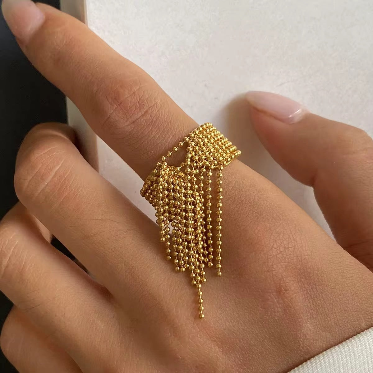 Vergoldeter Edelstahlring mit Quaste