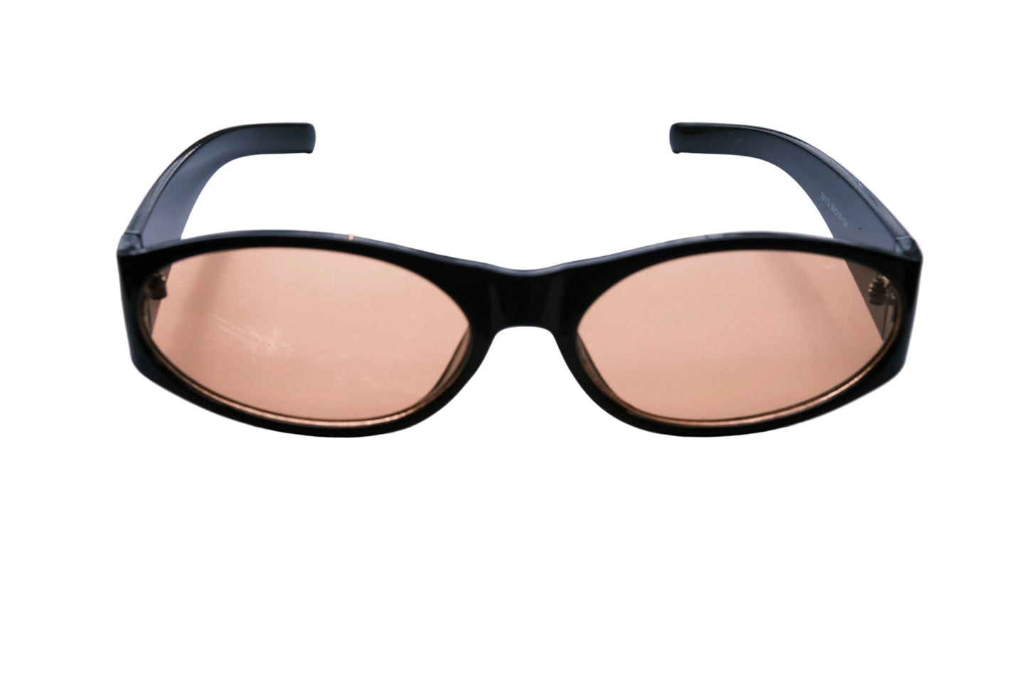 Black sunglasses with pink-tinted lenses on a white background