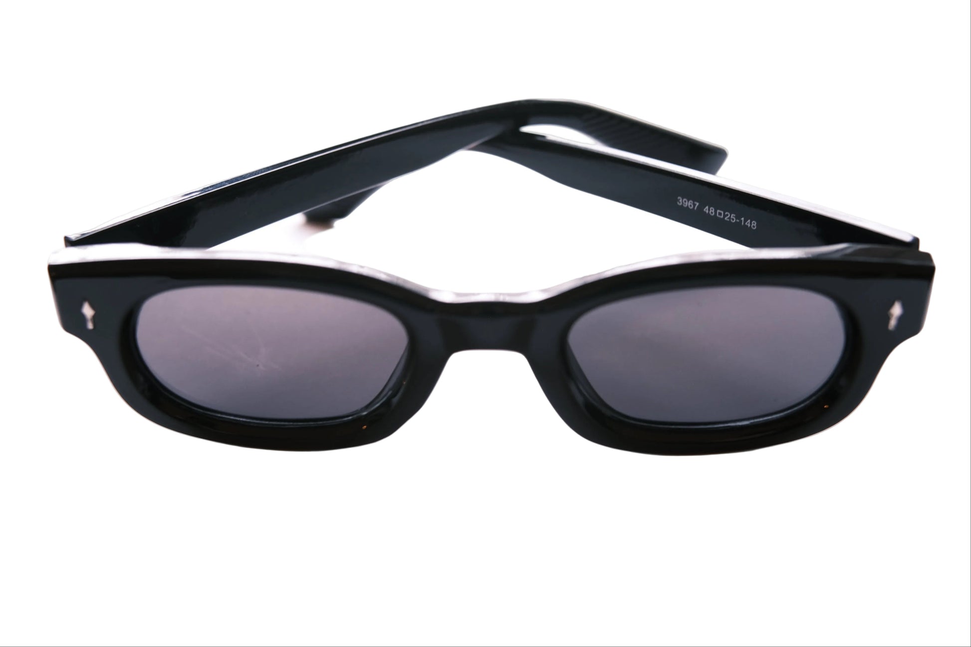 Black sunglasses with a white background