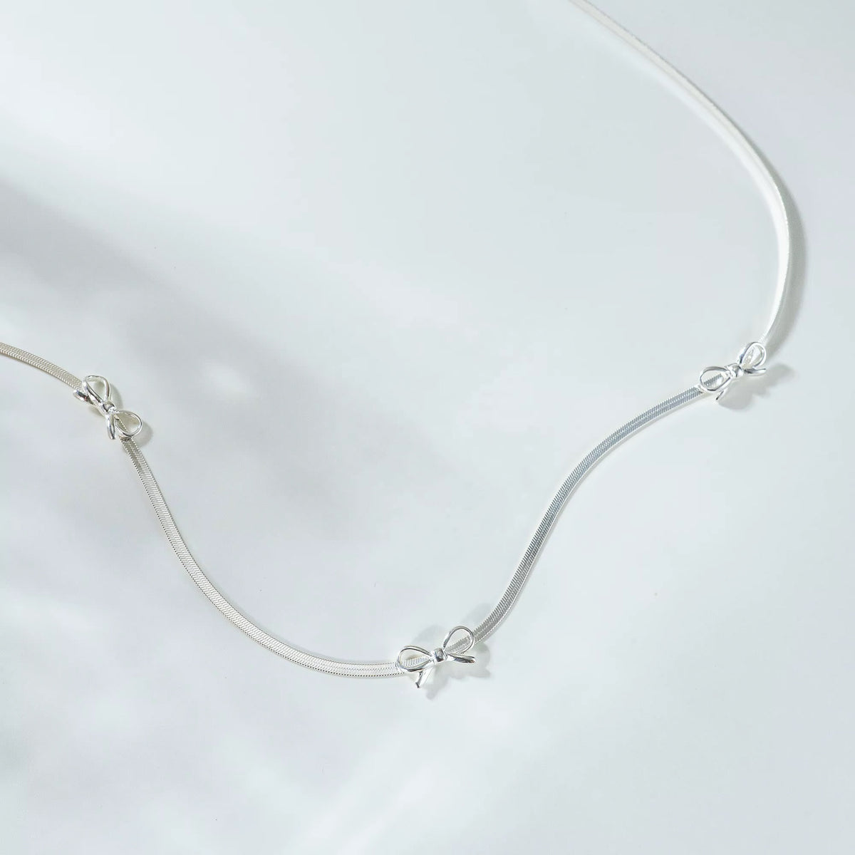 Gold Plated Stainless Steel Necklace- Bow Blade