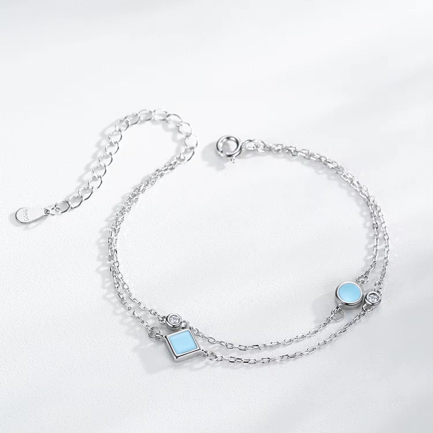 Rhodium Plated Sterling Silver Bracelet with Zircon Stones - Turquoise