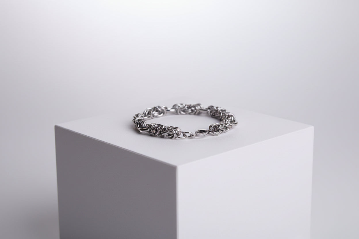 Silver chain bracelet on a white background